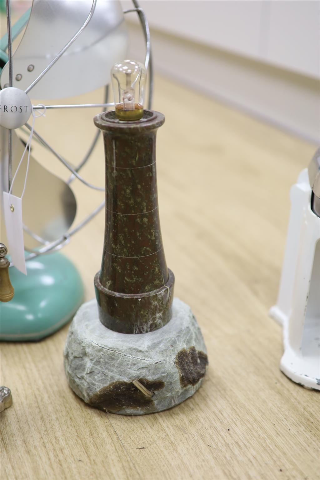 Early 20th century metal toaster and electric fan and lighthouse lamp and juicer
